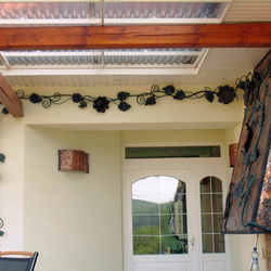 Tournesol exclusif en m�tal comme d�coration pour un foyer ext�rieur + luminaires forg�s