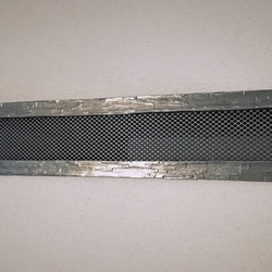 Grille forg�e pour chemin�e dans l'int�rieur de la maison individuelle