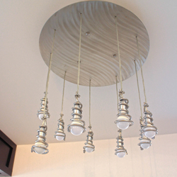 Suspension contemporaine en acier inoxydable � luminaire int�rieur design.